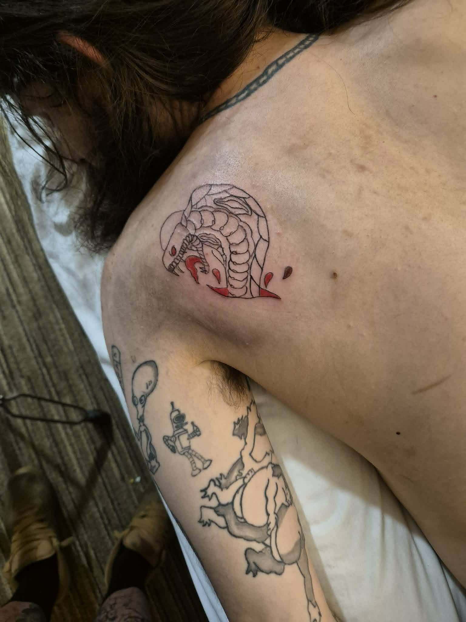 Neo-traditional cobra serpent tattoo