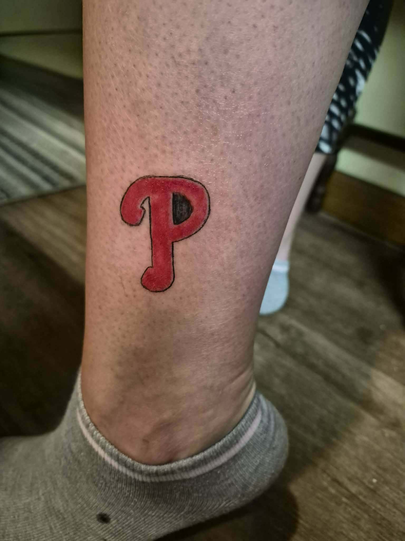 Philadelphia Phillies P tattoo on ankle — bold color